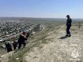 В Туве спасатели МЧС России предотвратили падение мужчины с горы Хербис